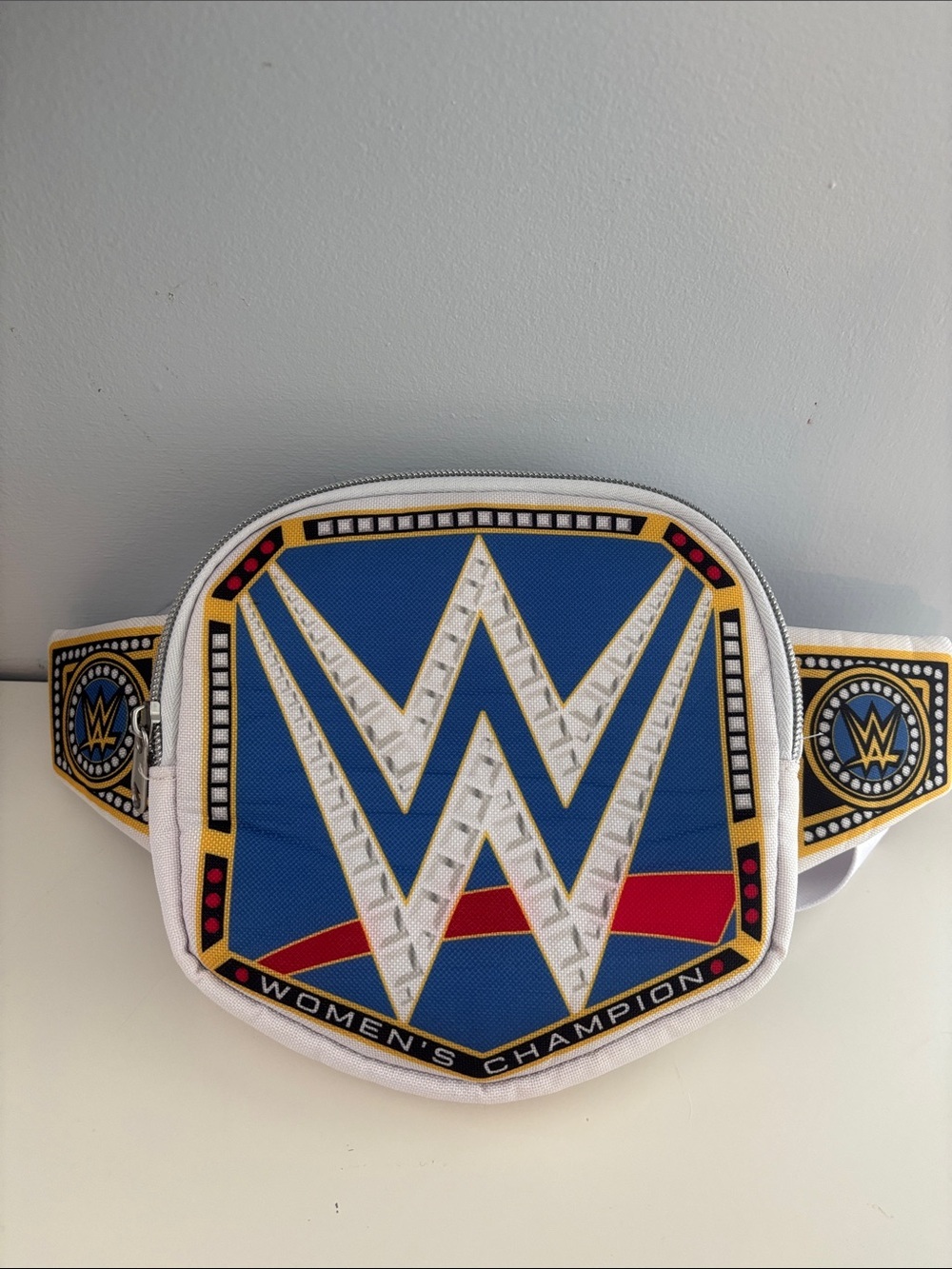 Loungefly WWE Women's Champion Belt Bag in Blue White Gold